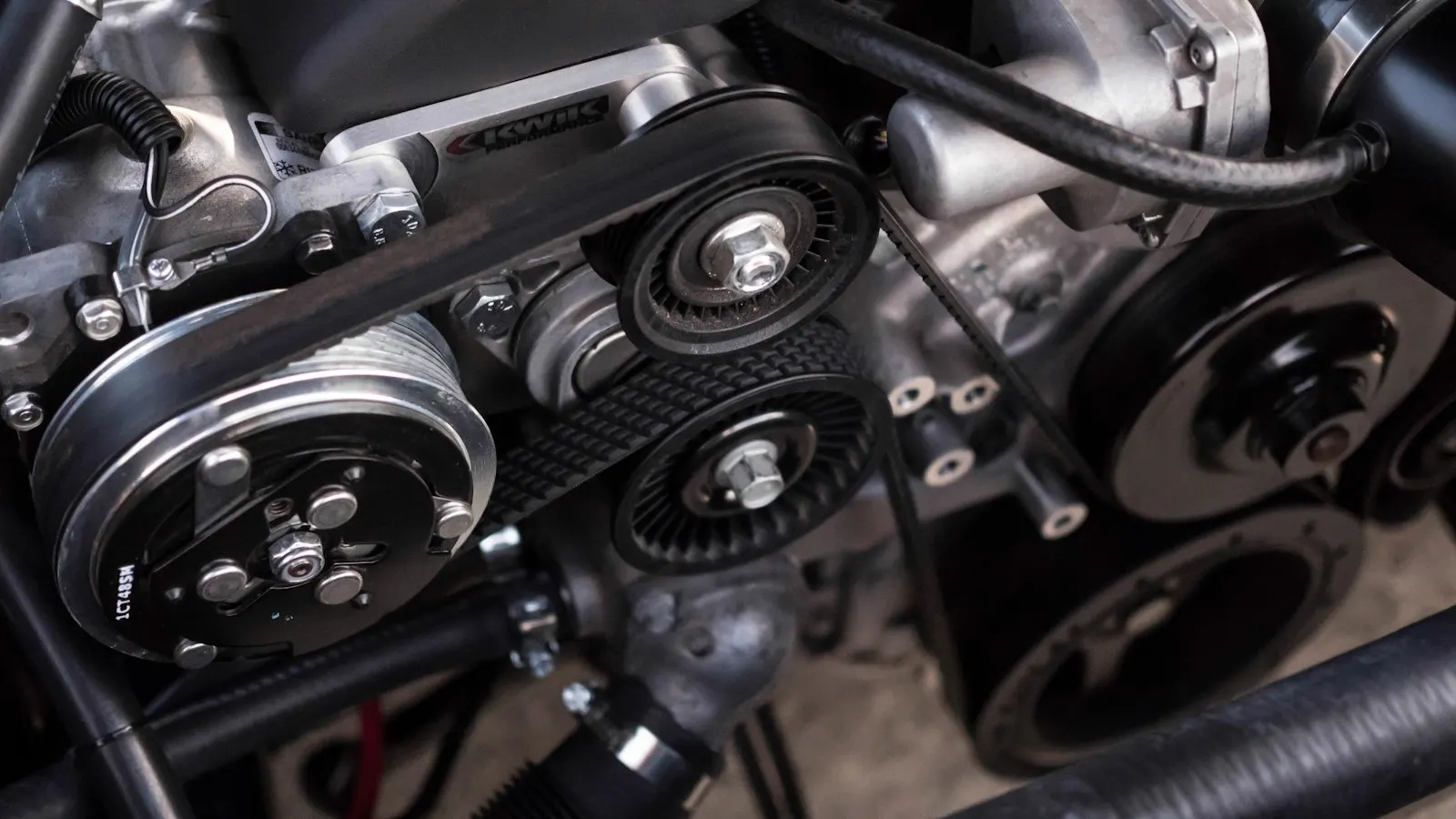 Serpentine belt and pulleys on a clean engine