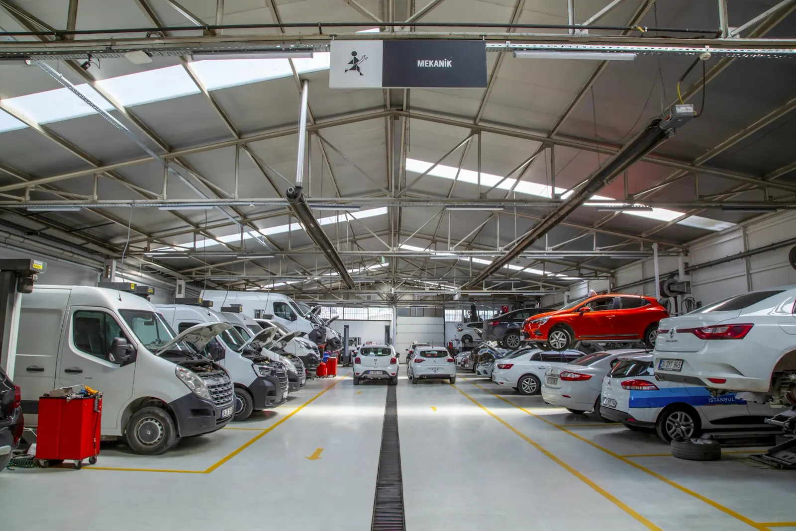 Row of vehicles lined up for service